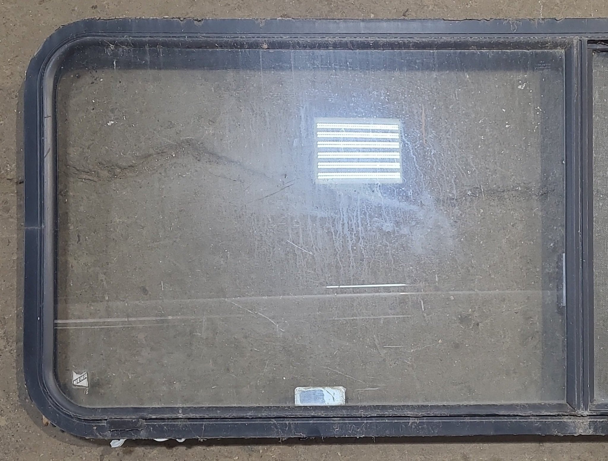 Used Black Radius Opening Window : 60 1/4" W x 21 3/4" H x 1 3/4" D - Young Farts RV Parts