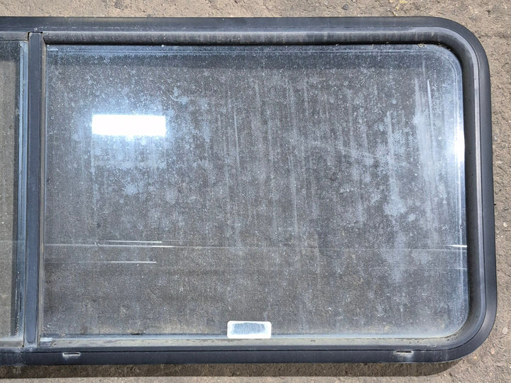 Used Black Radius Opening Window : 60 1/4" W x 21 3/4" H x 1 5/8" D - Young Farts RV Parts