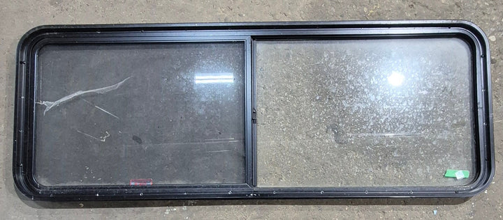 Used Black Radius Opening Window : 60 1/4" W x 21 3/4" H x 1 5/8" D - Young Farts RV Parts