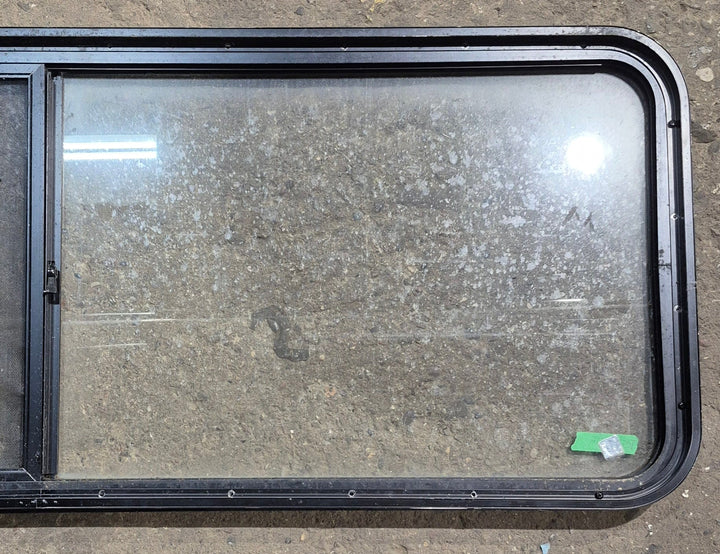 Used Black Radius Opening Window : 60 1/4" W x 21 3/4" H x 1 5/8" D - Young Farts RV Parts