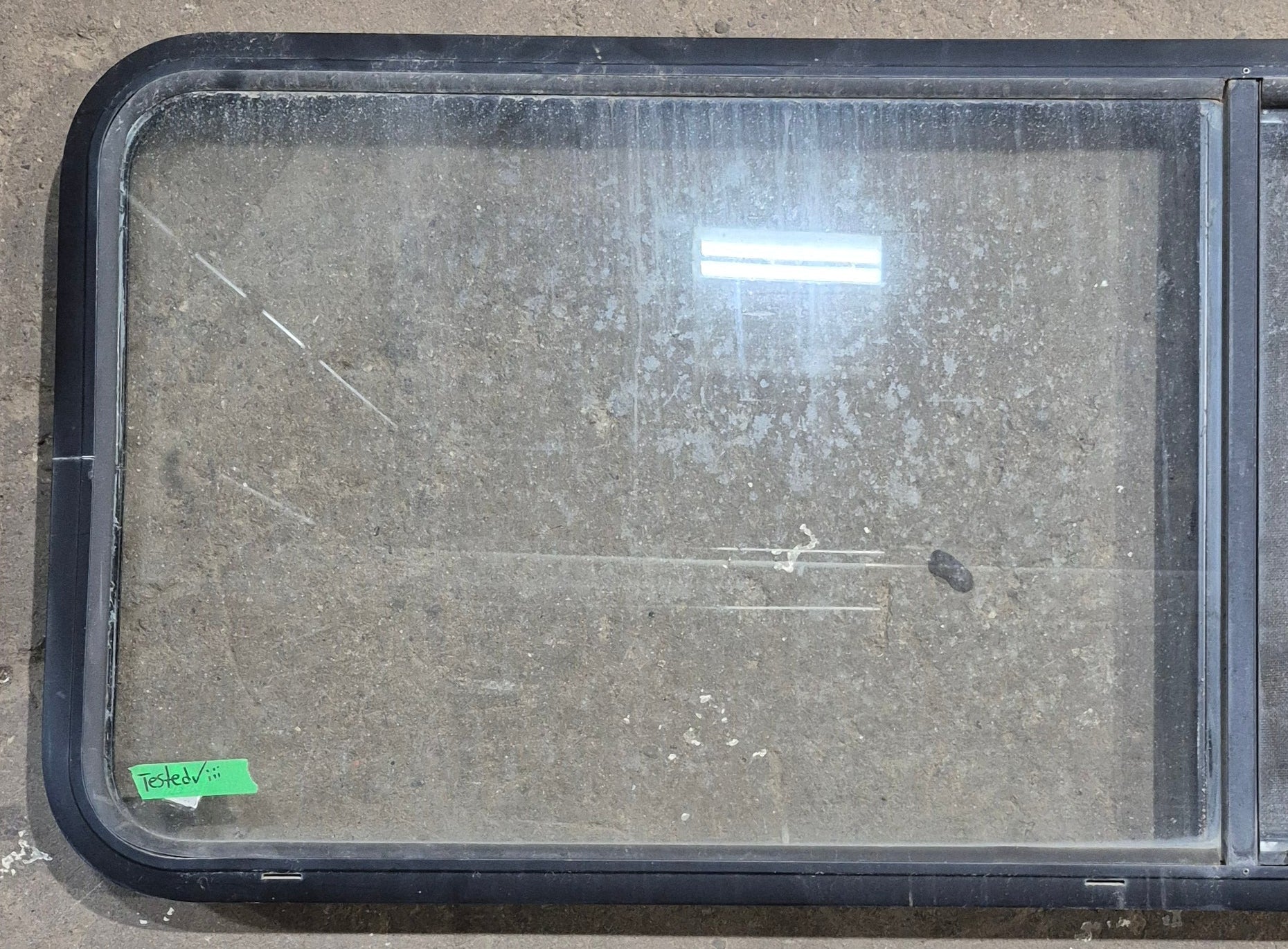 Used Black Radius Opening Window : 60 1/4" W x 21 3/4" H x 1 5/8" D - Young Farts RV Parts
