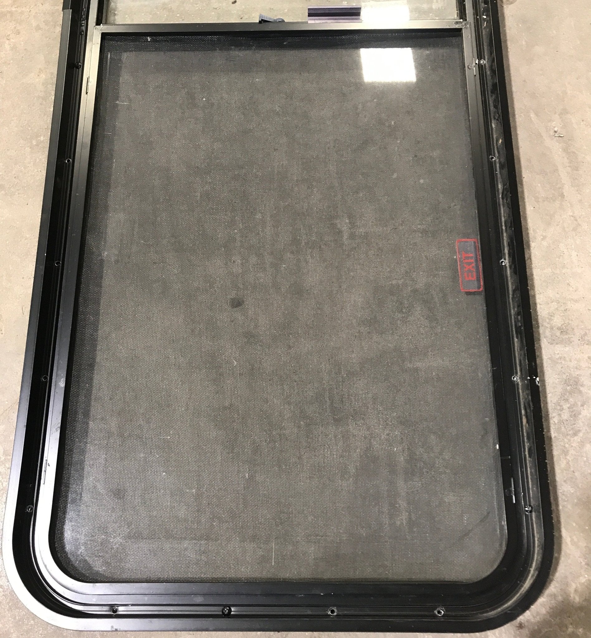 Used Black Radius Opening Window : 60 1/4" W x 21 3/4" H x 1 7/8" D - Young Farts RV Parts