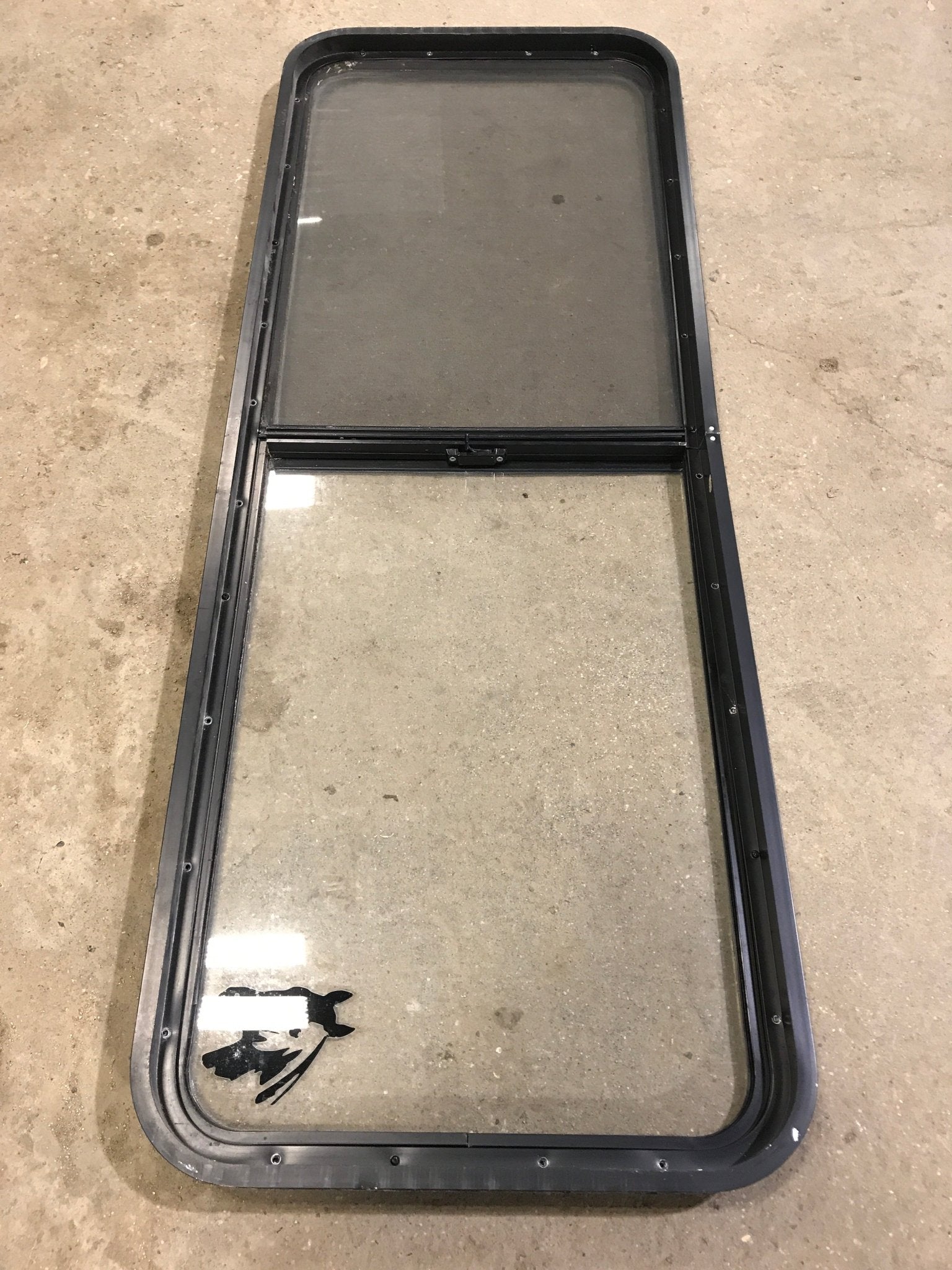 Used Black Radius Opening Window : 60" W x 21 1/2" H x 1 7/8" D - Young Farts RV Parts