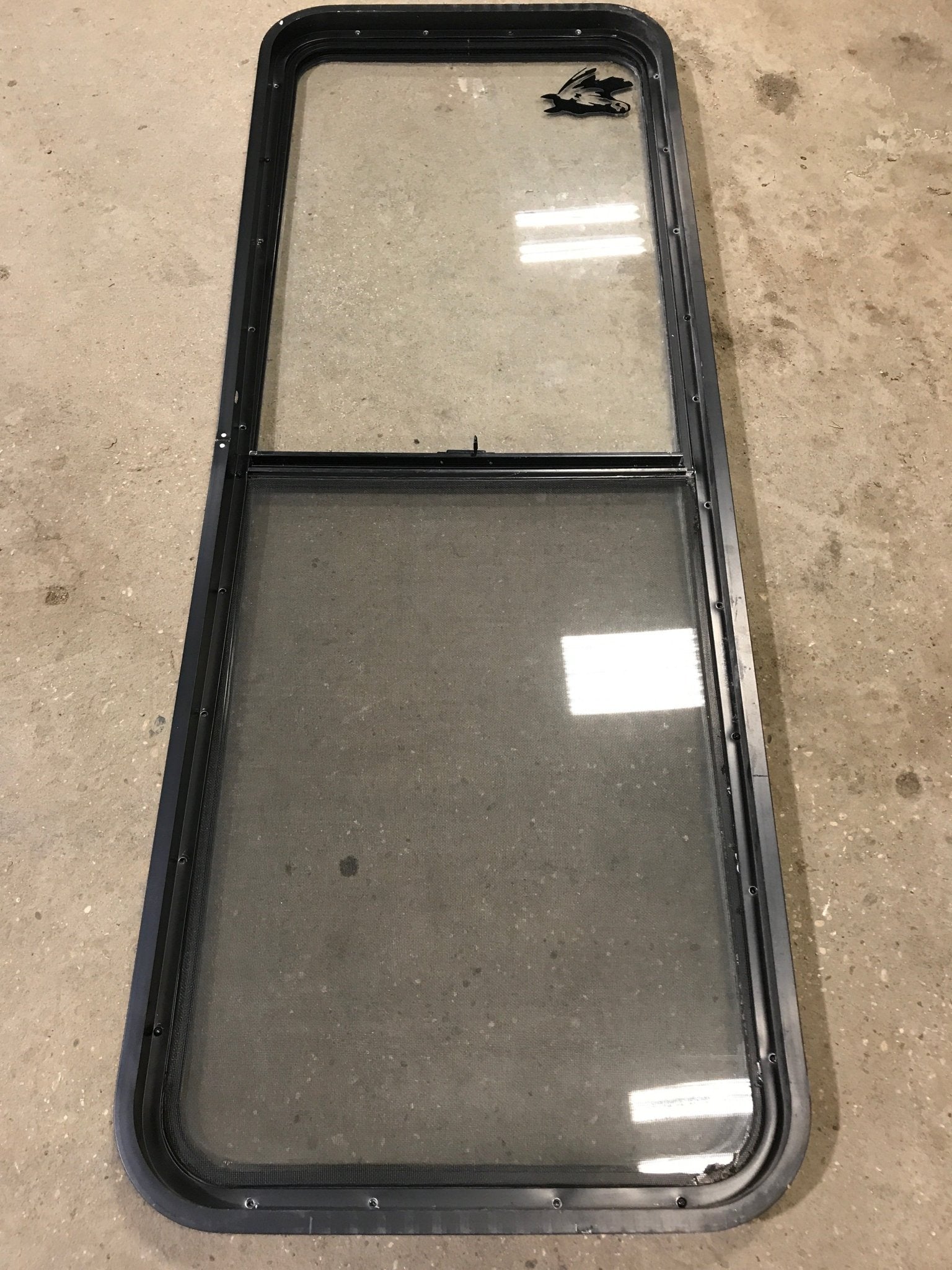 Used Black Radius Opening Window : 60" W x 21 1/2" H x 1 7/8" D - Young Farts RV Parts
