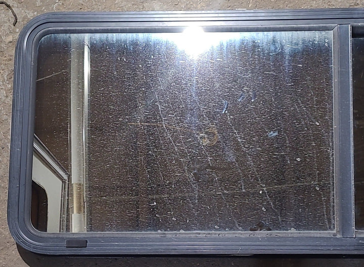 Used Black Radius Opening Window : 60" W x 21 1/2" H x 2" D - Young Farts RV Parts