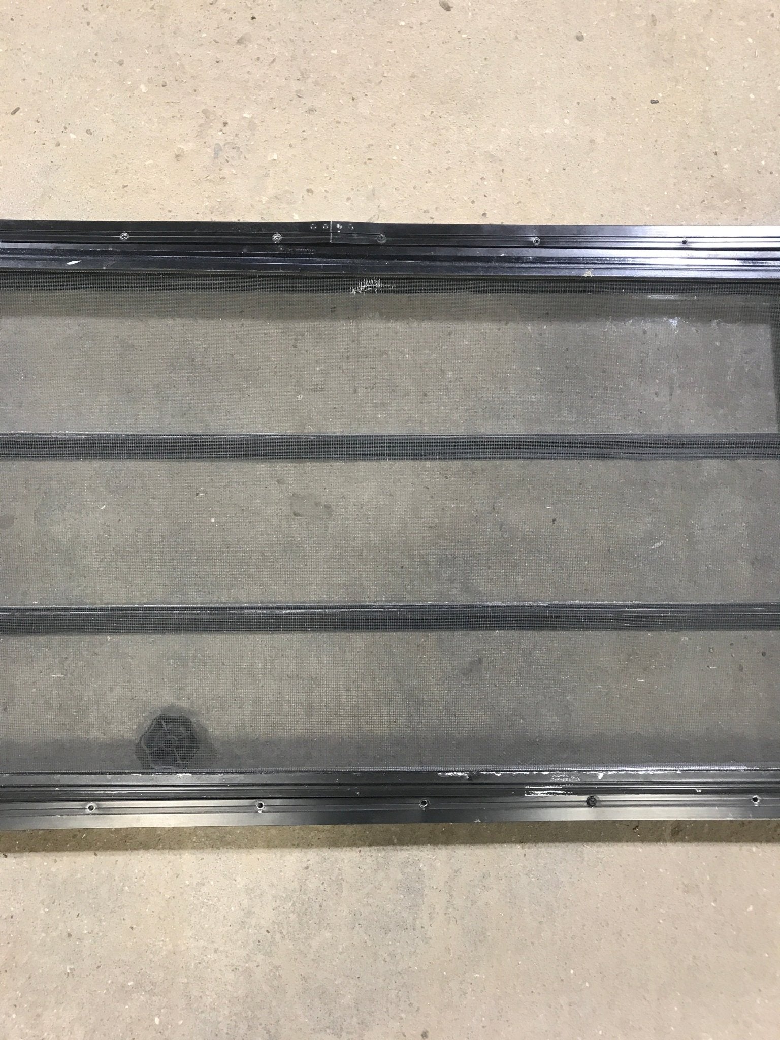 Used Black Radius Opening Window : 60" W x 21 3/4" H x 2" D - Young Farts RV Parts