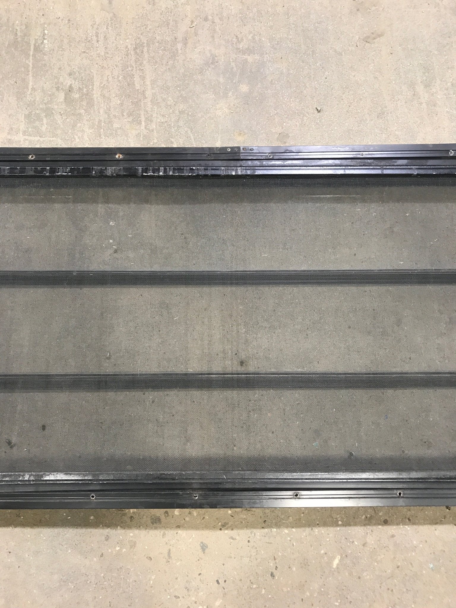 Used Black Radius Opening Window : 60" W x 21 3/4" H x 2" D - Young Farts RV Parts