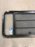 Used Black Radius Opening Window : 60" W x 21 3/4" H x 2" D - Young Farts RV Parts