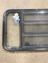Used Black Radius Opening Window : 60" W x 21 3/4" H x 2" D - Young Farts RV Parts