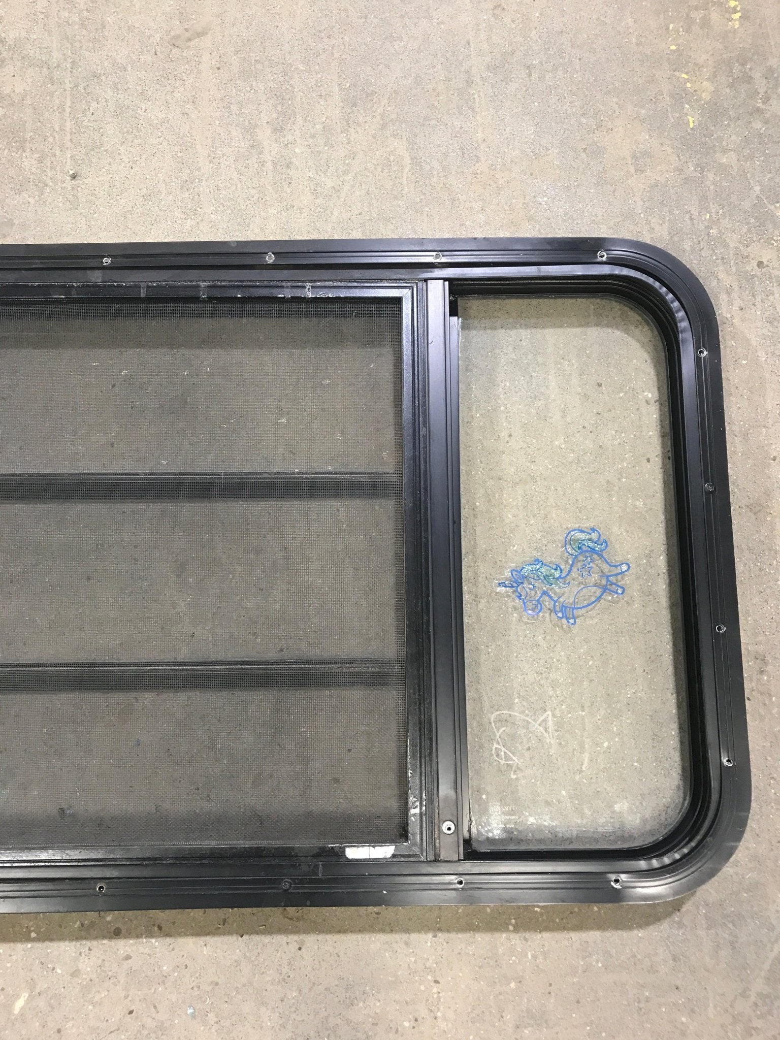 Used Black Radius Opening Window : 60" W x 21 3/4" H x 2" D - Young Farts RV Parts