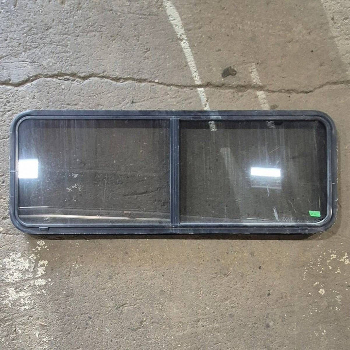 Used Black Radius Opening Window - 60 X 23 1/2 X 2 - Young Farts RV Parts