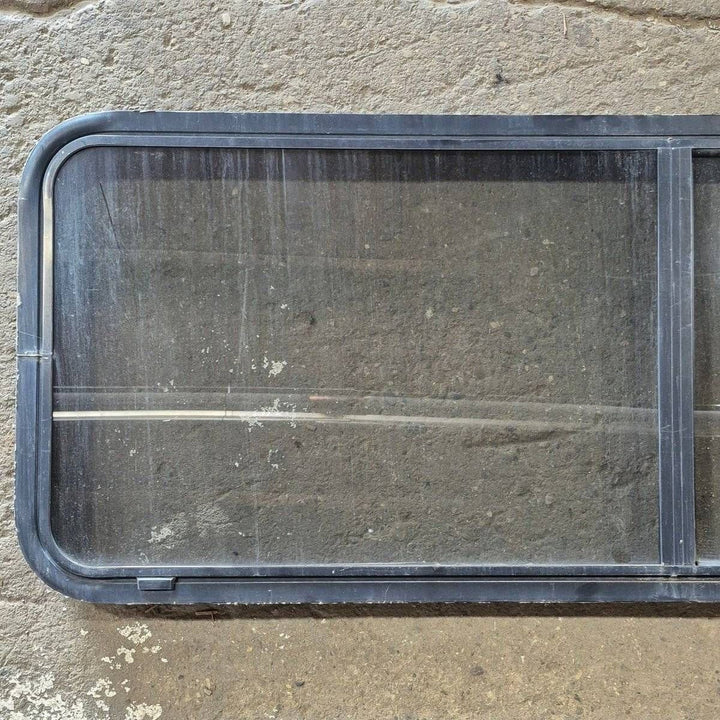 Used Black Radius Opening Window - 60 X 23 1/2 X 2 - Young Farts RV Parts
