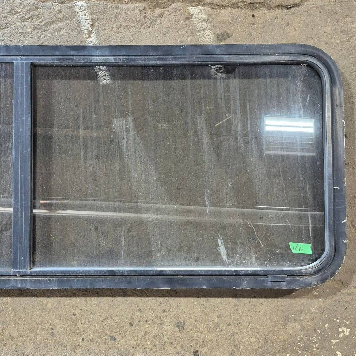 Used Black Radius Opening Window - 60 X 23 1/2 X 2 - Young Farts RV Parts