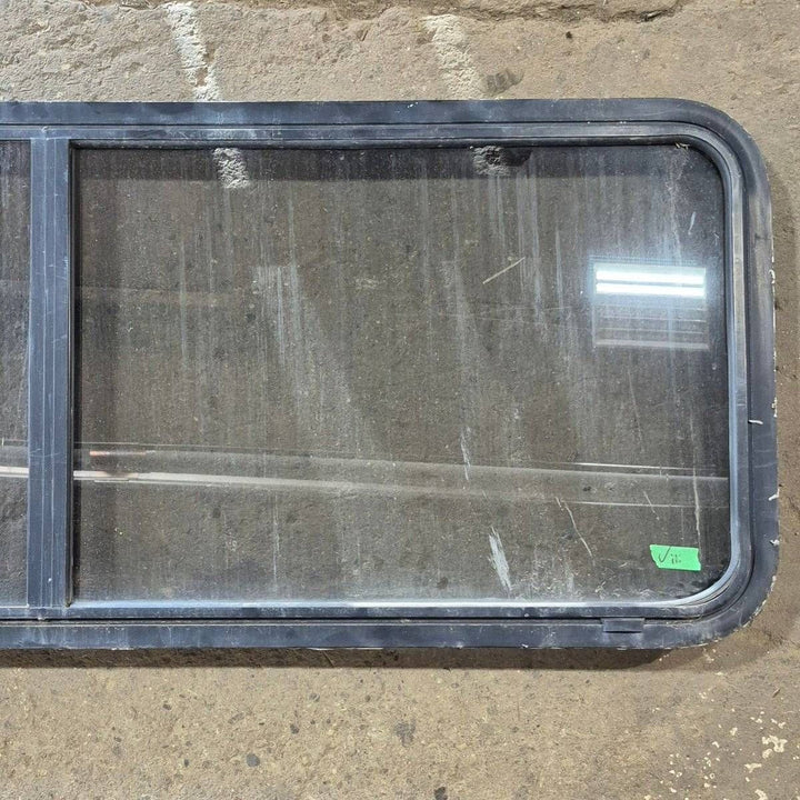 Used Black Radius Opening Window - 60 X 23 1/2 X 2 - Young Farts RV Parts