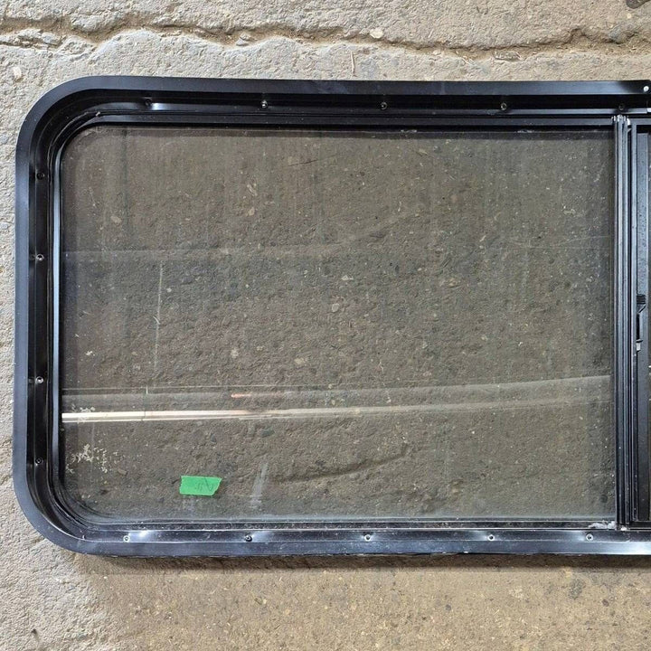 Used Black Radius Opening Window - 60 X 23 1/2 X 2 - Young Farts RV Parts