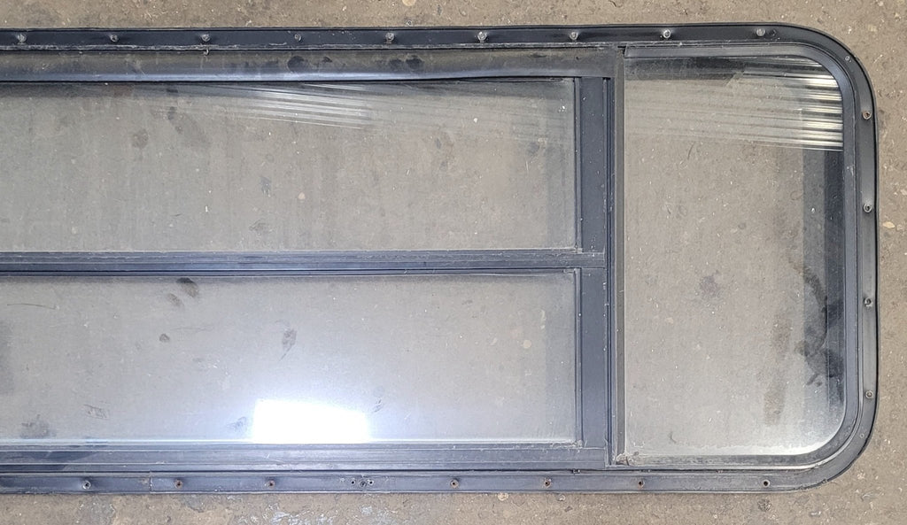 Used Black Radius Opening Window : 61 3/4" W x 19 1/2" H x 1 3/4" D - Young Farts RV Parts