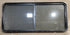 Used Black Radius Opening Window : 64 1/4" W x 28 3/4" H x 1 3/4" - Young Farts RV Parts