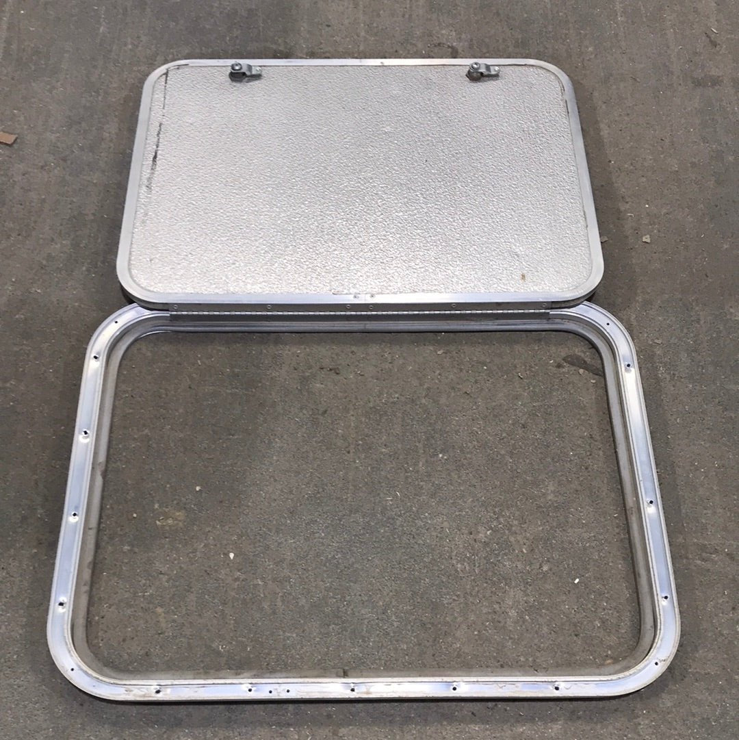 Used Corner Radius Cargo Door 23 3/4" W x 17 3/4" H x 3/4"D - Young Farts RV Parts