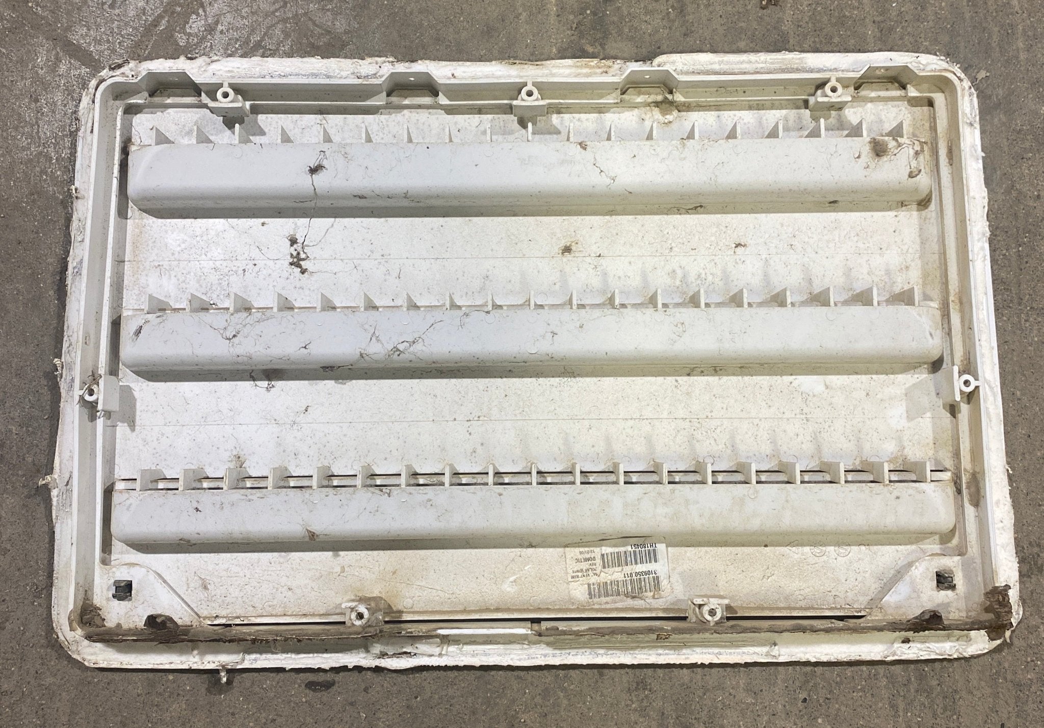 Used DOMETIC 3109350.011 - Yellowed Air Intake Side Refrigerator Vent - HAS FRAME - Young Farts RV Parts
