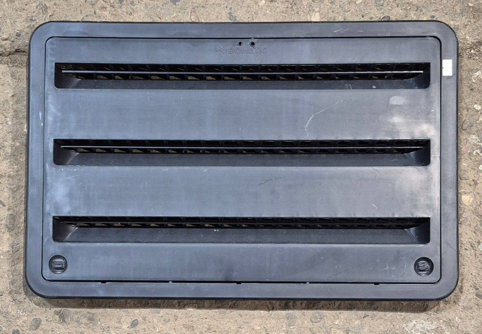 Used DOMETIC 3109350.065 - Black Air Intake Side Refrigerator Vent - HAS FRAME - Young Farts RV Parts