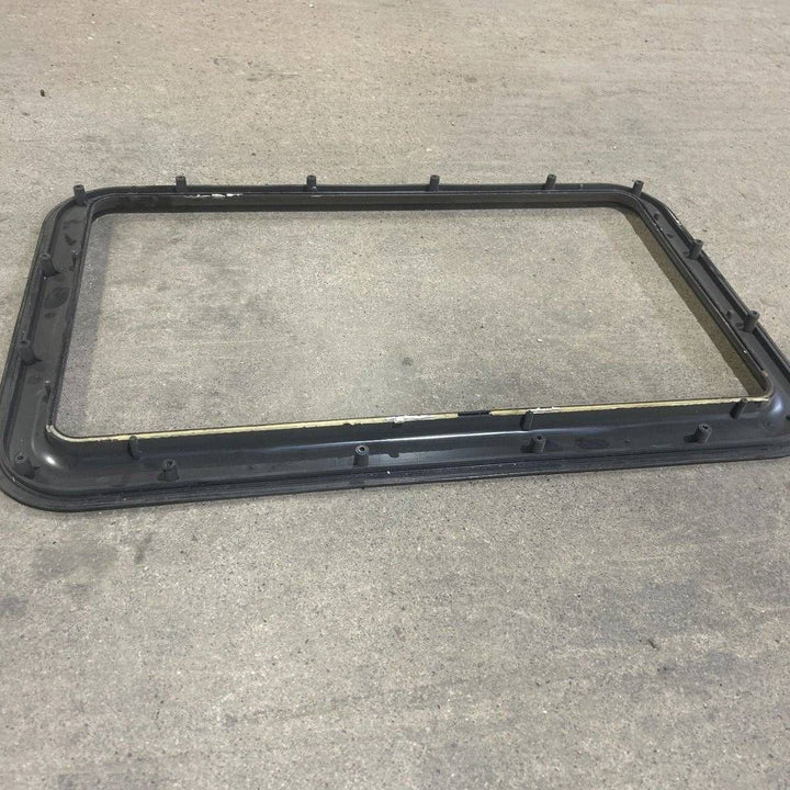 Used Exterior Entry door window Frame: 24 3/4" x 15 3/4" - Young Farts RV Parts
