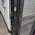 Used Lippert Toy Hauler Patio Wall Armor System Screen Door, Right Side - 82 1/4" X 47 5/8" - Young Farts RV Parts