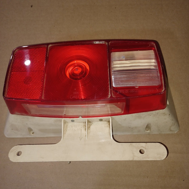 Used Microflex SAE-AILR(2) ST-72 D.O.T Taillight Assembly, With License Plate Bracket - Young Farts RV Parts