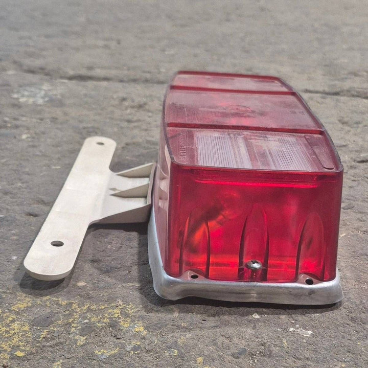 Used Miro-Flex RV Tail Light Assembly, With License Plate Bracket, 10 1/8" X 7" X 2 3/4" - 340 - Young Farts RV Parts