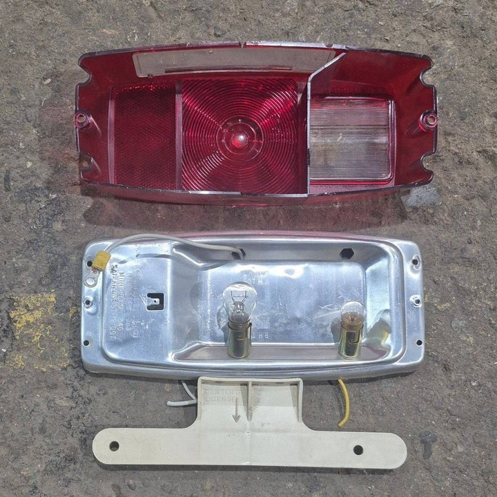 Used Miro-Flex RV Tail Light Assembly, With License Plate Bracket, 10 1/8" X 7" X 2 3/4" - 340 - Young Farts RV Parts