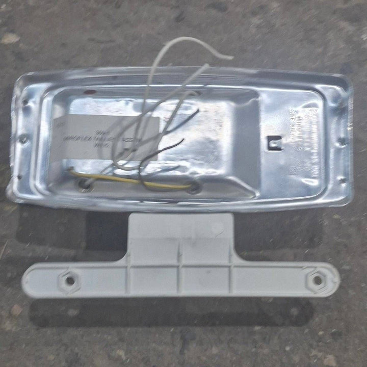 Used Miro-Flex RV Tail Light Assembly, With License Plate Bracket, 10 1/8" X 7" X 2 3/4" - 340 - Young Farts RV Parts