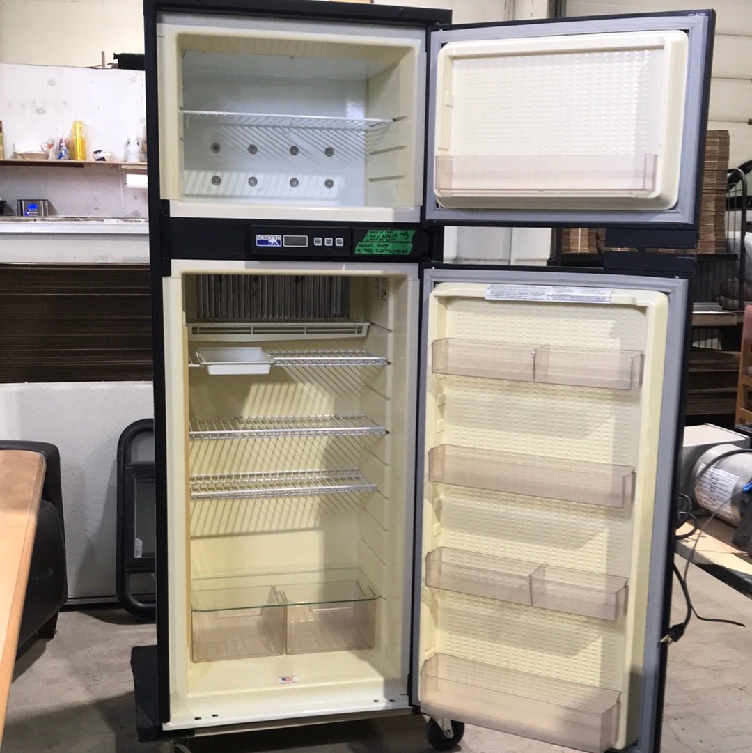 Used NORCOLD 983 refrigerator 59 1/2