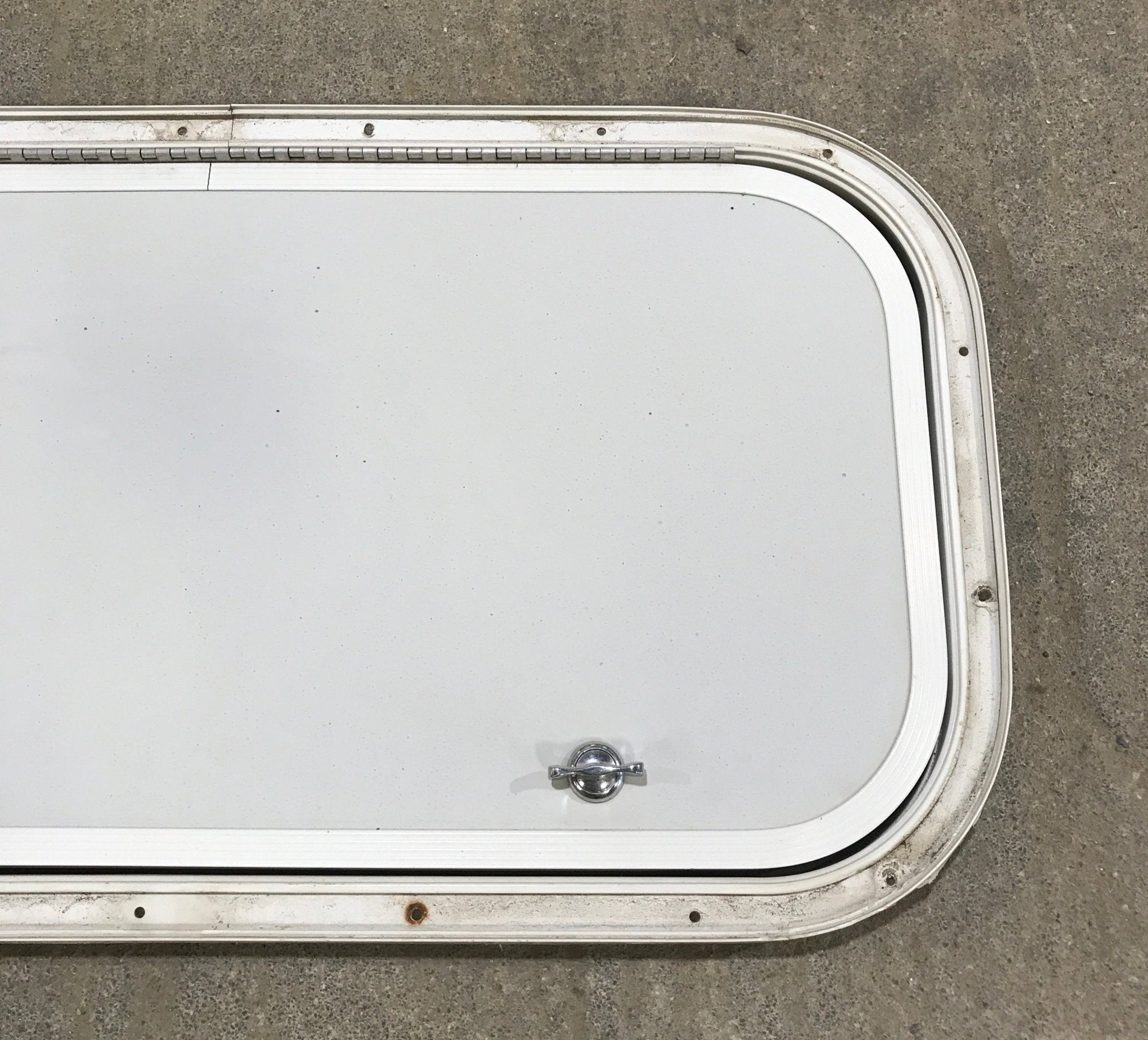 Used Radius Cargo / compartment Door 23 1/2" W x 11 1/2" H - Young Farts RV Parts