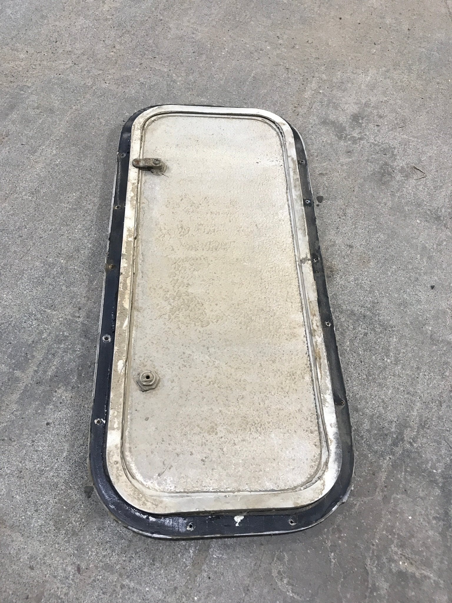 Used Radius Cargo / compartment Door 23 3/4" W x 9 3/4" H - Young Farts RV Parts