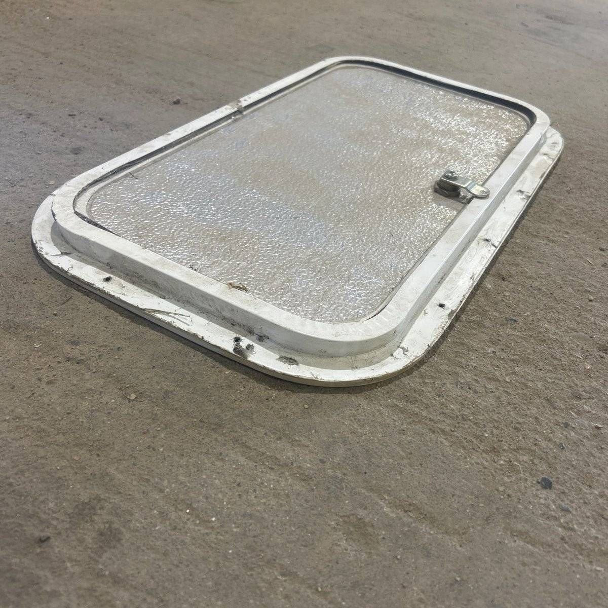 Used Radius Cargo Door - 19.75 X 10.75 X 0.625 - Young Farts RV Parts