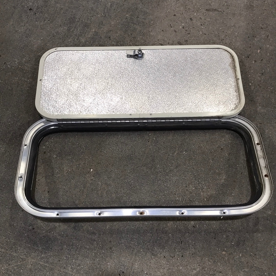 Used Radius Cargo Door 23 7/8" W x 10 3/4" x 3/4" D - Young Farts RV Parts
