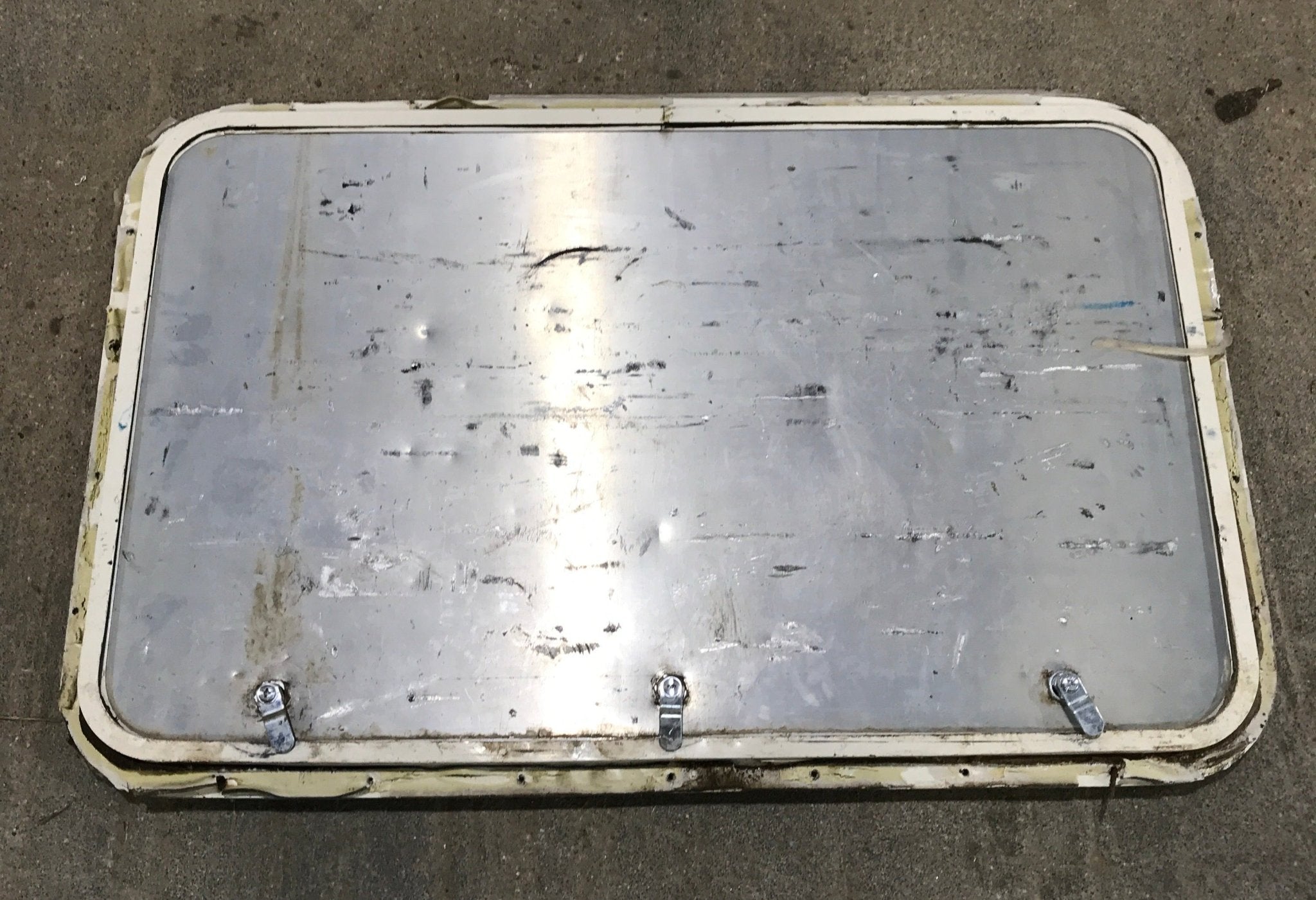 Used Radius Cargo Door 32 1/4" W x 20 1/2" H x 3/4" D - Young Farts RV Parts