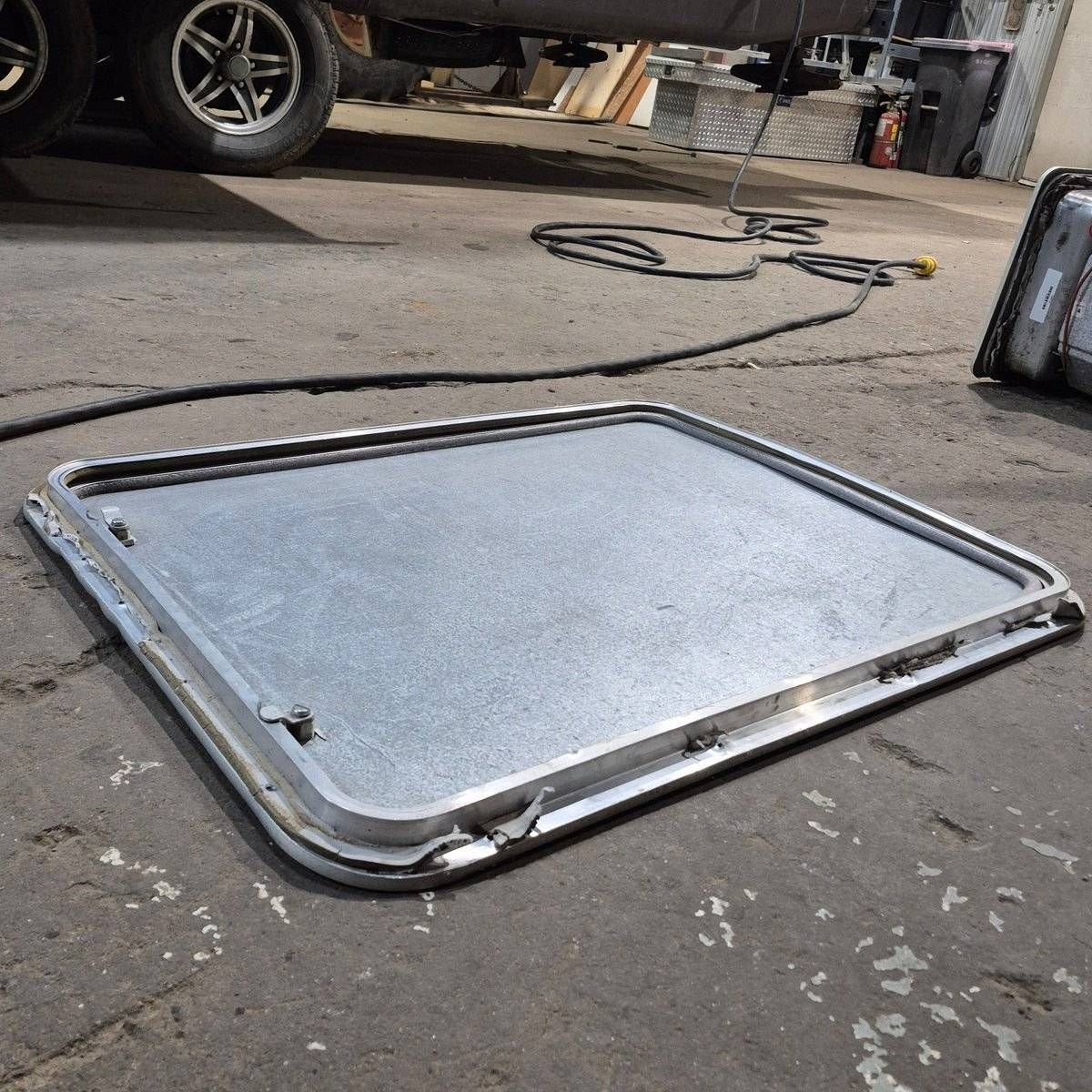 Used Radius Cargo Door - 32.5 X 24.25 X 0.75 - Young Farts RV Parts
