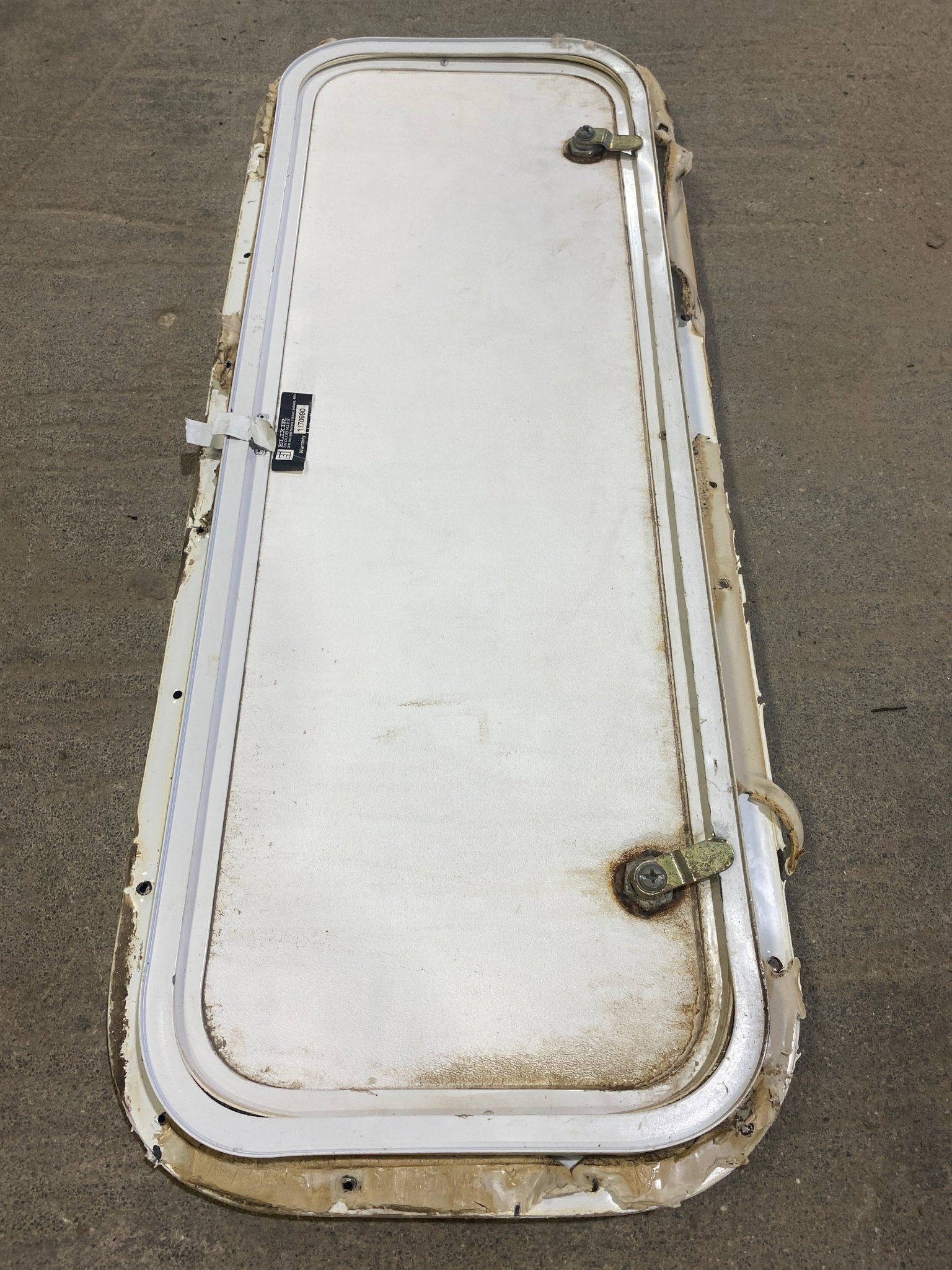 Used Radius Corner Cargo Door 29 3/4" W x 10 3/4" H x 3/4" D - Young Farts RV Parts