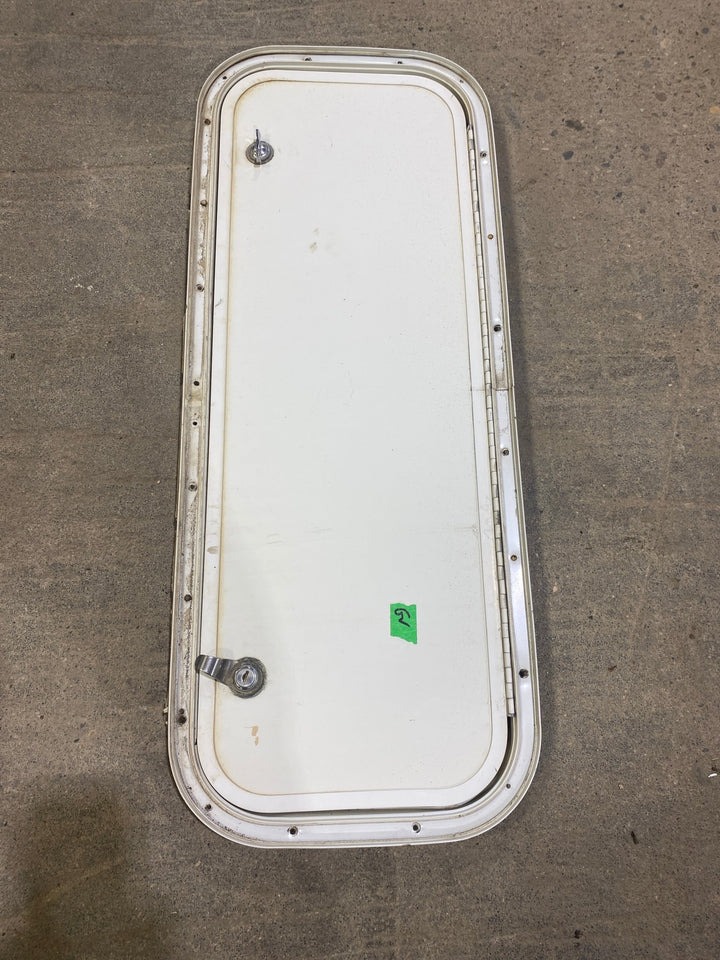 Used Radius Corner Cargo Door 29 3/4" W x 10 3/4" H x 3/4" D - Young Farts RV Parts