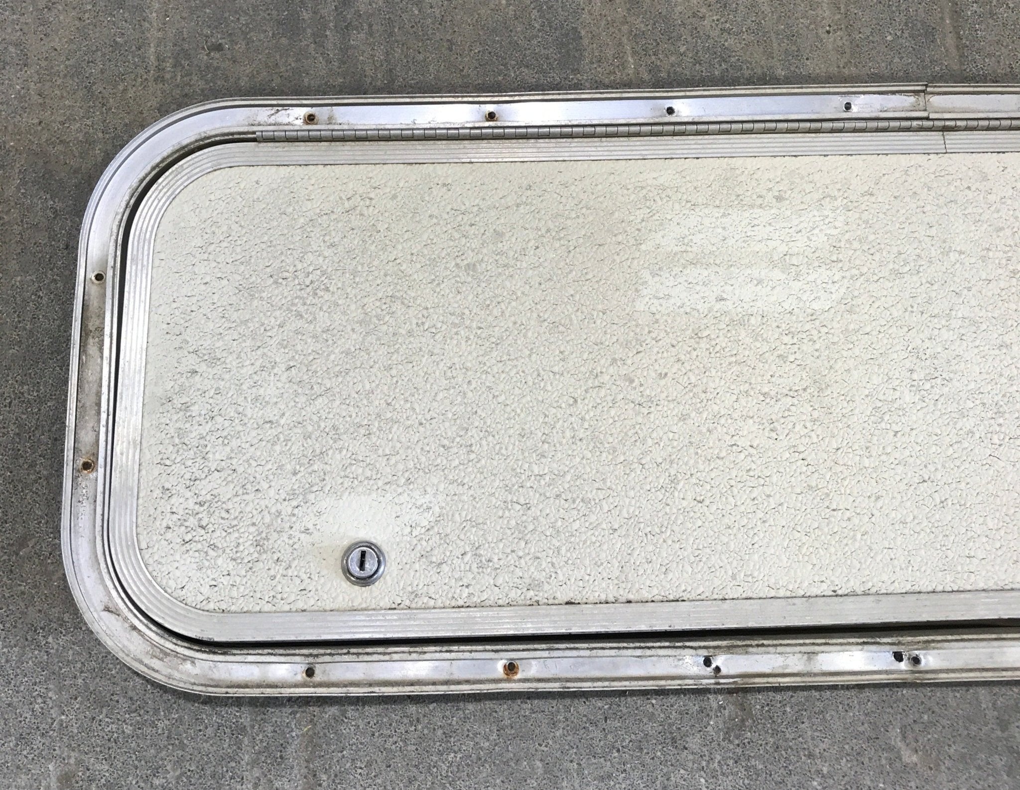 Used Radius Corner Cargo Door 35 1/2" W x 11" H x 3/4" D - Young Farts RV Parts