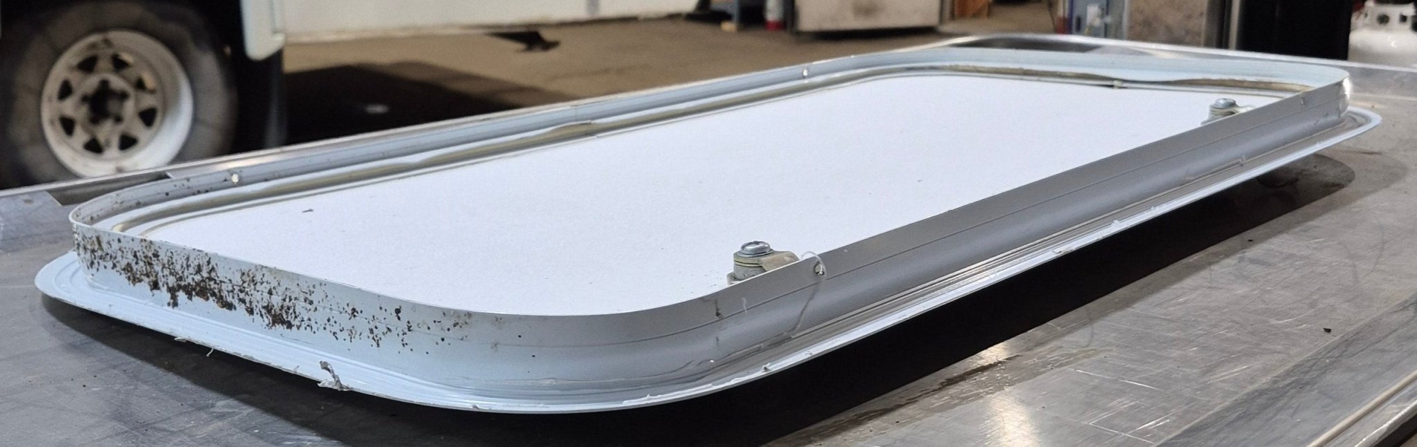 Used Radius Cornered Cargo Door 13 7/8" x 26 1/2" x 1" - Young Farts RV Parts