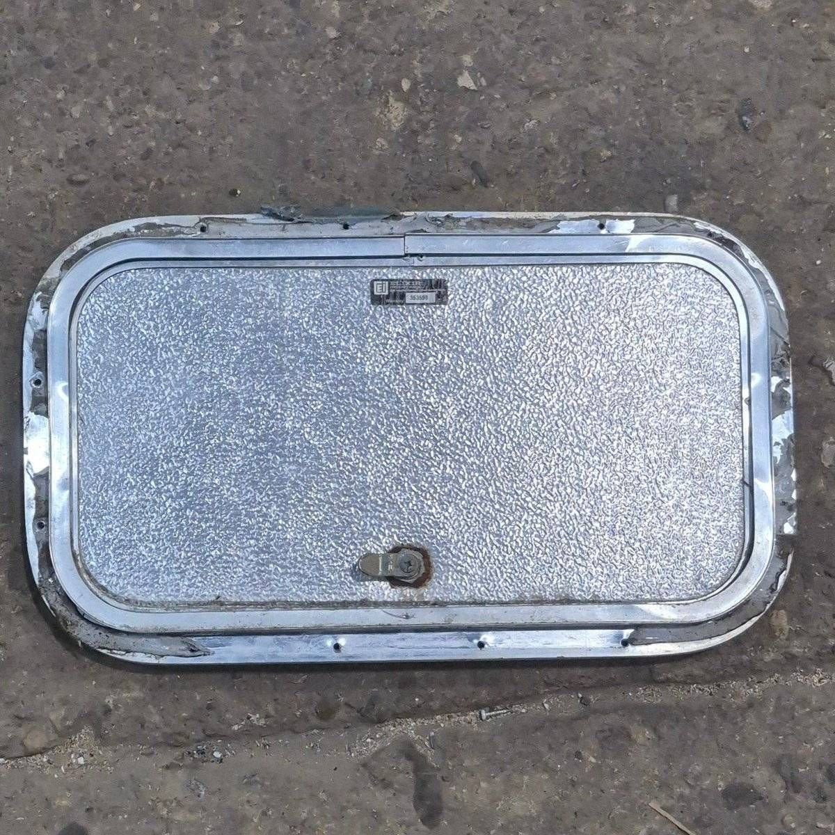 Used Radius Cornered Cargo Door - 19 7/8" X 10 7/8" X 3/4" - Young Farts RV Parts