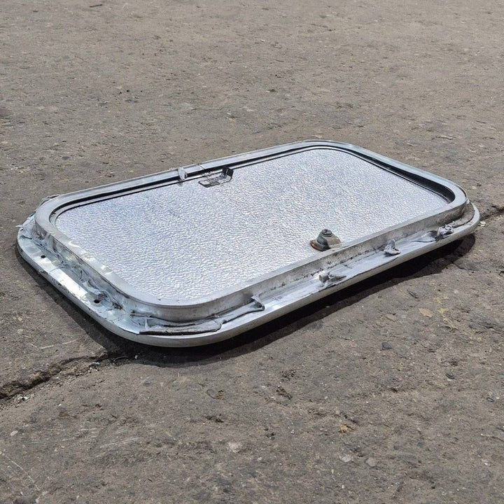 Used Radius Cornered Cargo Door - 19 7/8" X 10 7/8" X 3/4" - Young Farts RV Parts