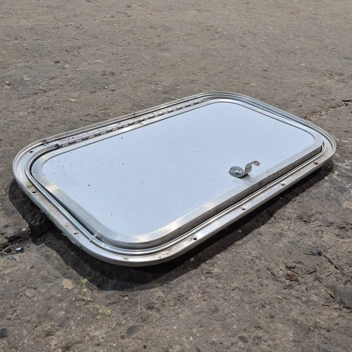 Used Radius Cornered Cargo Door - 19 7/8" X 10 7/8" X 3/4" - Young Farts RV Parts