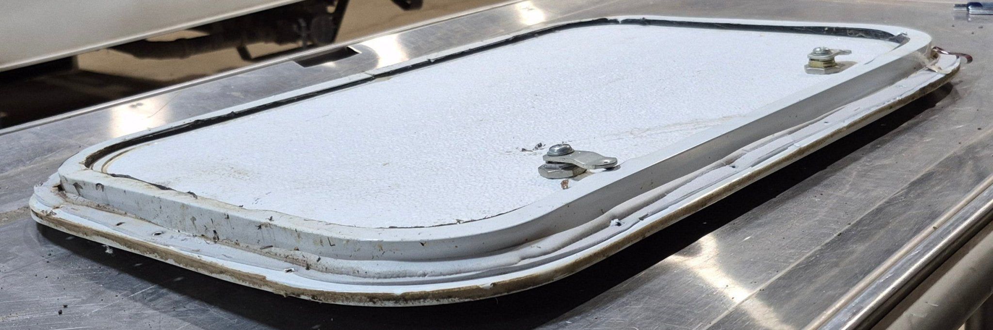 Used Radius Cornered Cargo Door 21 3/4" x 13 7/8" x 1/2" - Young Farts RV Parts