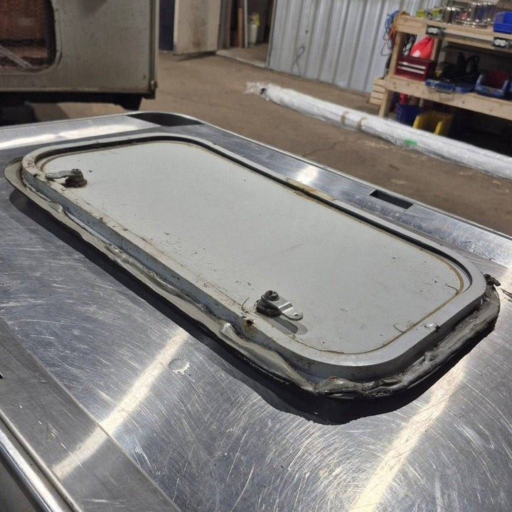 Used Radius Cornered Cargo Door - 21 7/8" X 11 3/4" X 1/2" - Young Farts RV Parts