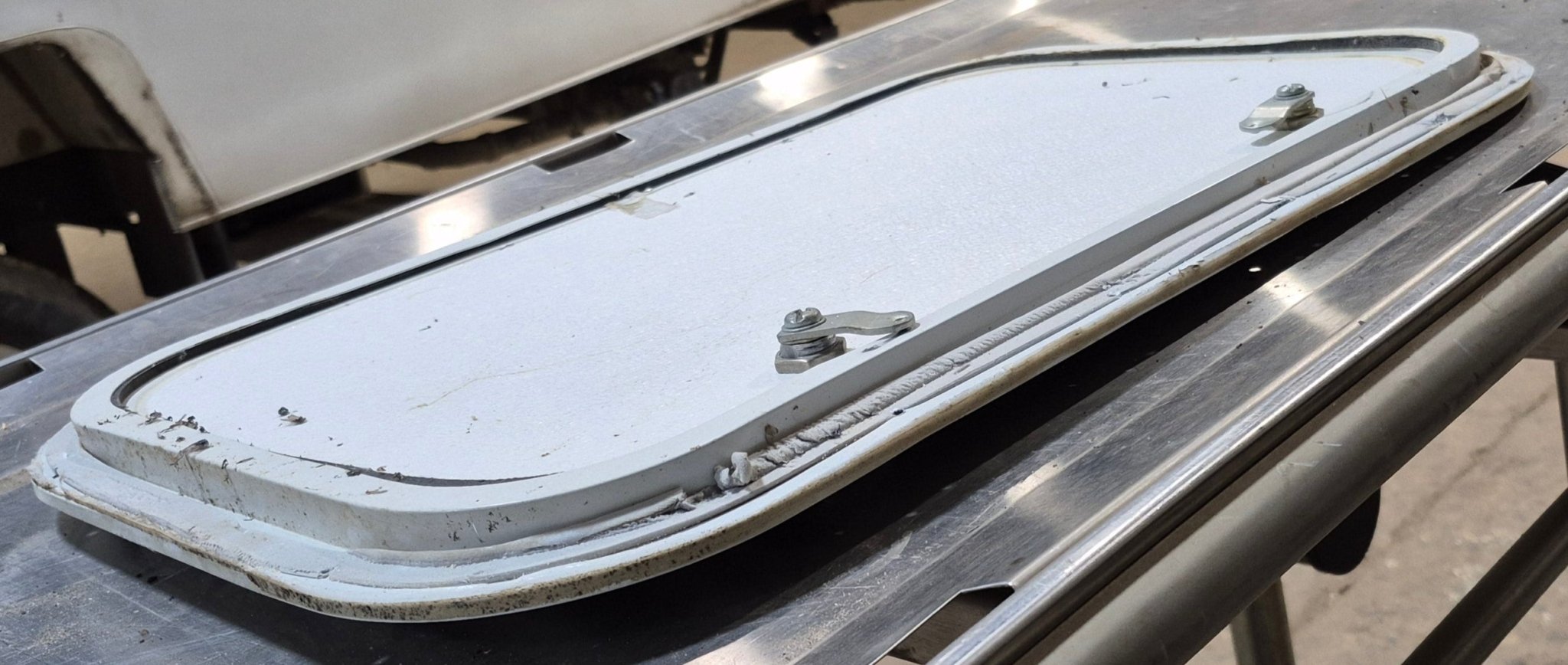 Used Radius Cornered Cargo Door 21 7/8" x 13 3/4" x 1/2" - Young Farts RV Parts