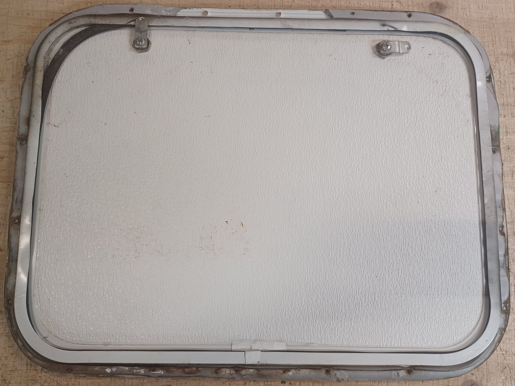 Used Radius Cornered Cargo Door 23 3/4" x 17 5/8" x 5/8"D - Young Farts RV Parts