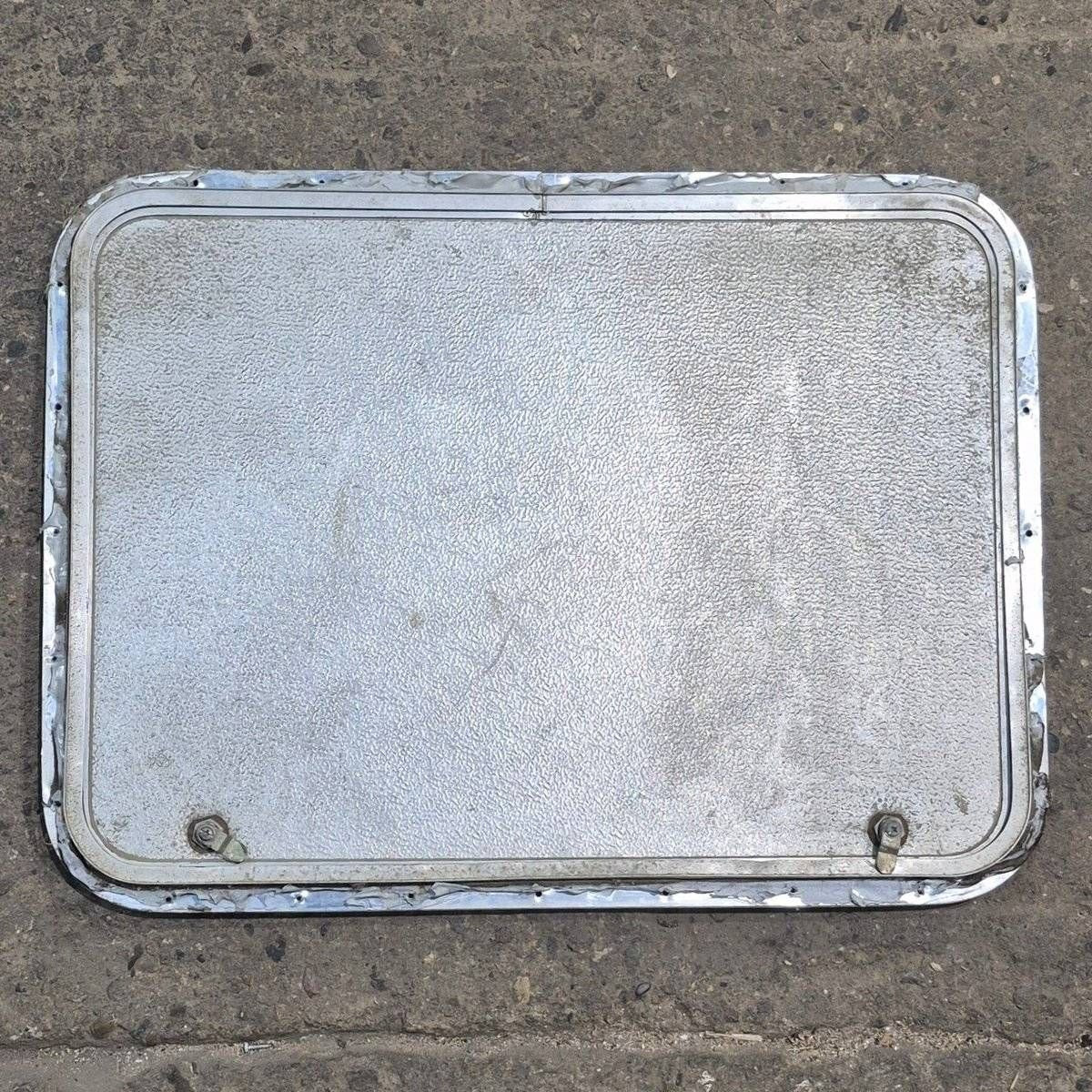Used Radius Cornered Cargo Door - 30" X 22" X 3/4" - Young Farts RV Parts