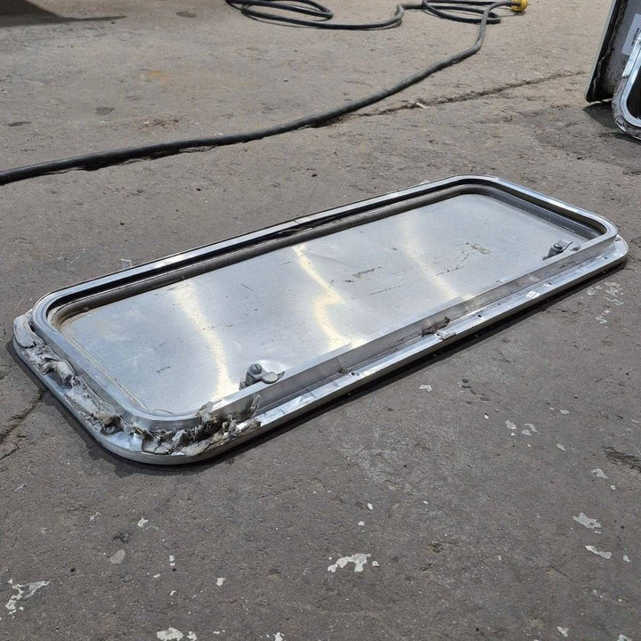 Used Radius Cornered Cargo Door - 31.75 X 11 X 0.75 - Young Farts RV Parts